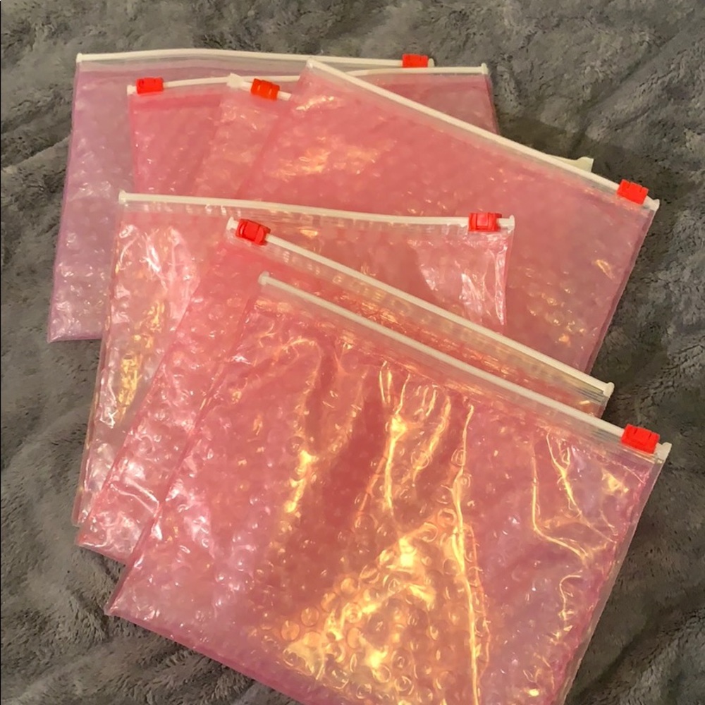 6 medium sized & 1 large glossier bags
